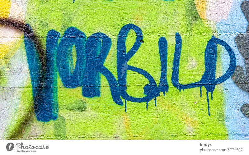 Role model - colorful graffiti on a wall role model function Word Characters Graffiti Youth culture variegated Wall (barrier) unbiased universally Trashy