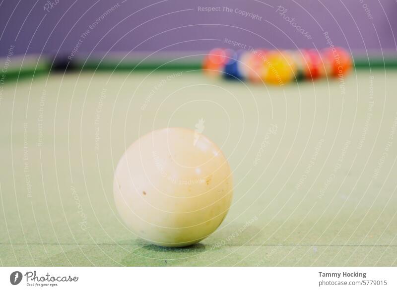 Pool table set up with white ball centered ready to be sent down to the triangle of coloured balls on the pool table game Snooker snooker table Colour photo