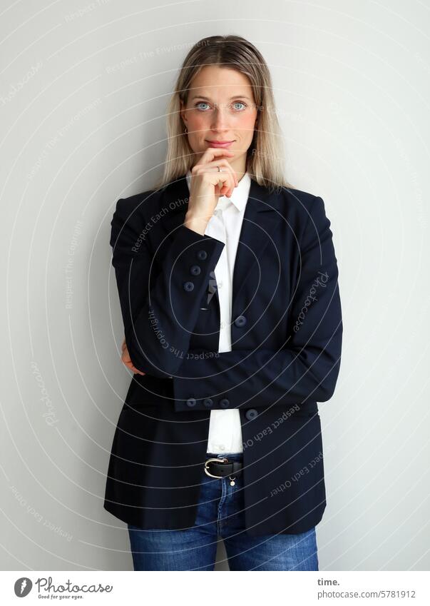 Woman in jacket Shirt Businesswomen test Long-haired Jacket Looking into the camera Blonde portrait Feminine Hand kind crossed arm jeans Isolated Image