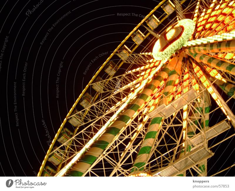 ferris wheel at night Theme-park rides Ferris wheel Festival Shooting match Amusement Park Holy Synod Night Dark Light Romance Exterior shot Visual spectacle