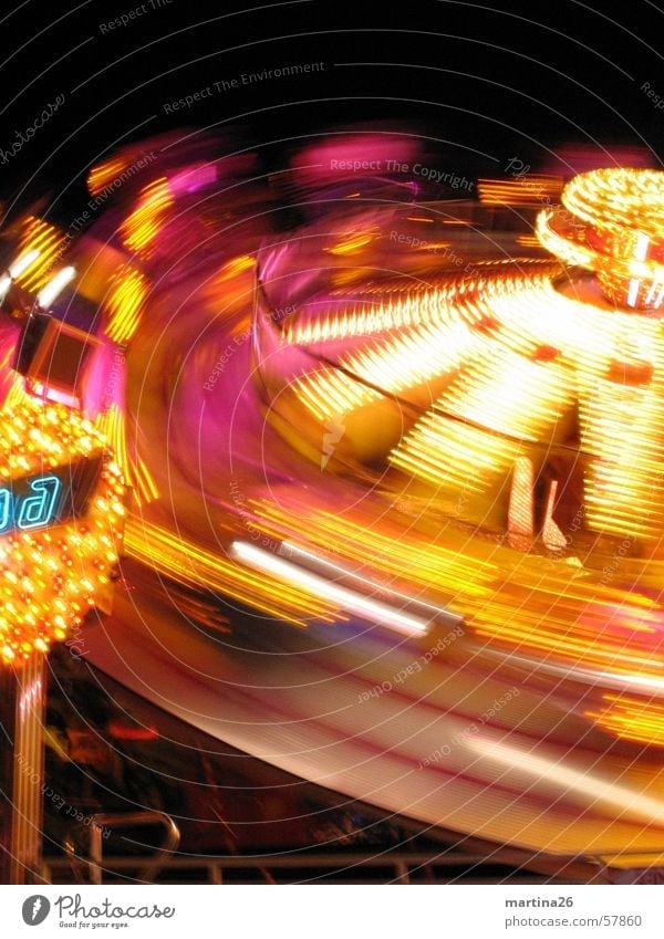 Please spin again 3 Carousel Fairs & Carnivals Lifeless Speed Rotate Light Night Dark Multicoloured Leisure and hobbies Theme-park rides Joy Exterior shot