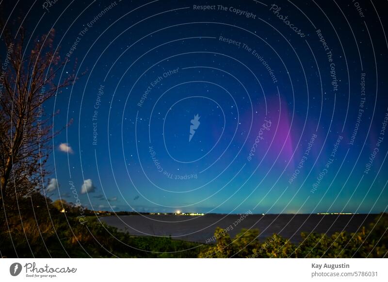 northern lights luminous phenomenon skylights aurora borealis Aurora Borealis Nitrogen atoms Weather phenomenon Solar wind particles Oxygen atoms