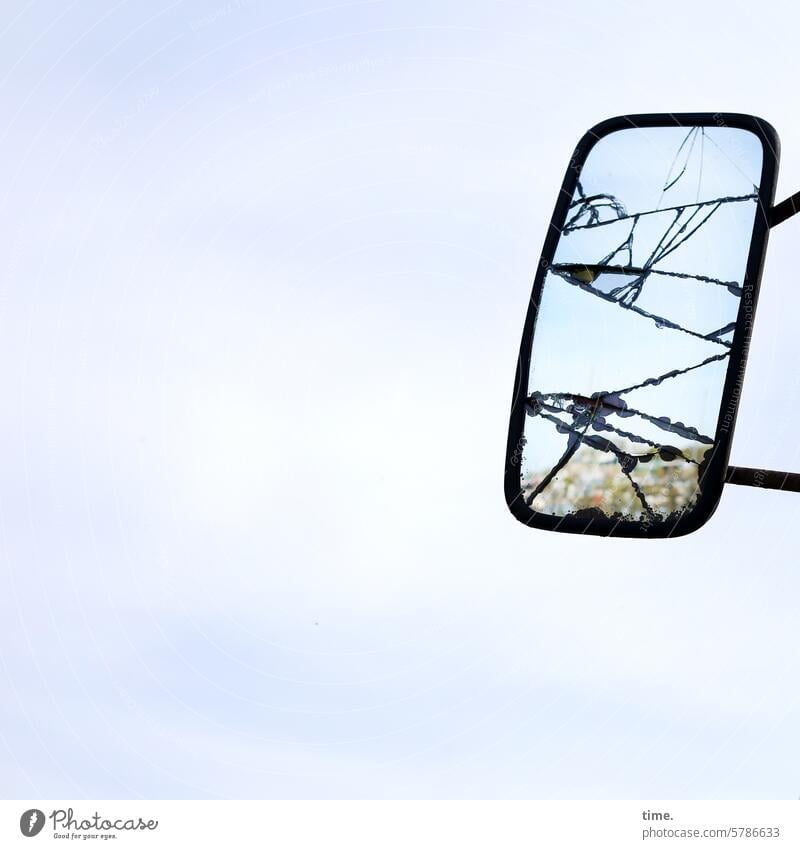 pretty freaky | rear view mirror Mirror Rear view mirror exterior mirrors Glass lorry Broken Sky Clouds Reflection Vehicle part Scrapyard Slivered fragmented