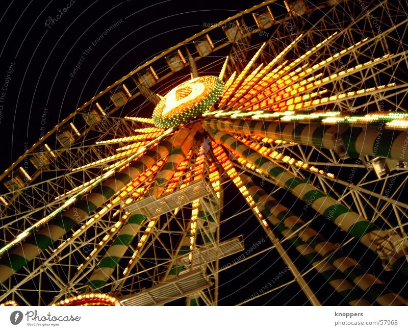 Ferris wheel at night. Third. Theme-park rides Festival Shooting match Amusement Park Holy Synod Night Dark Light Romance Exterior shot Visual spectacle fair