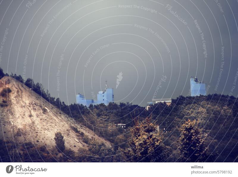 Monte Schlacko in Geisweid, with a view of the University of Siegen Slagheap Slag heap mountain Forest dark sky skyscrapers light blue university victories