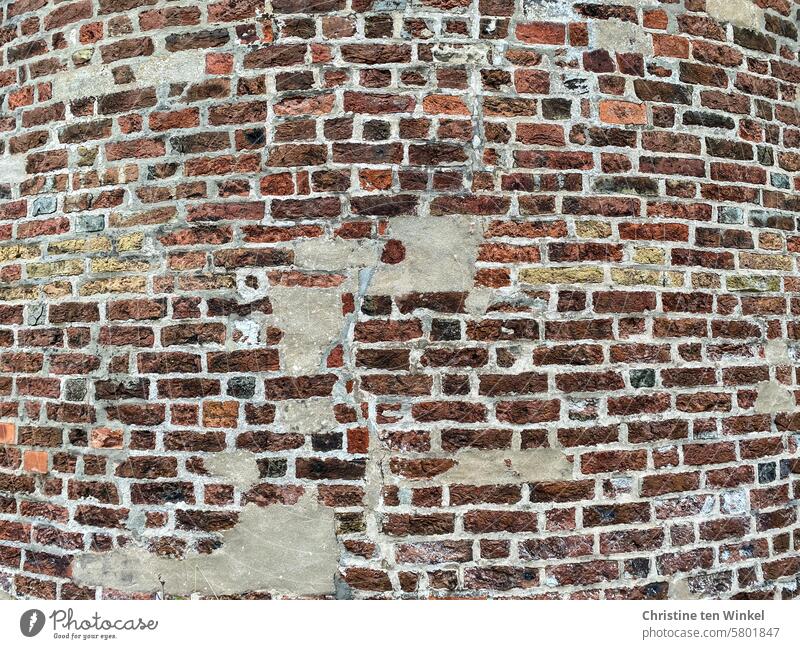 Old patched masonry Brick facade Brick wall Wall (building) Wall (barrier) Red repaired Bricks Facade vintage Structures and shapes Stone Manmade structures