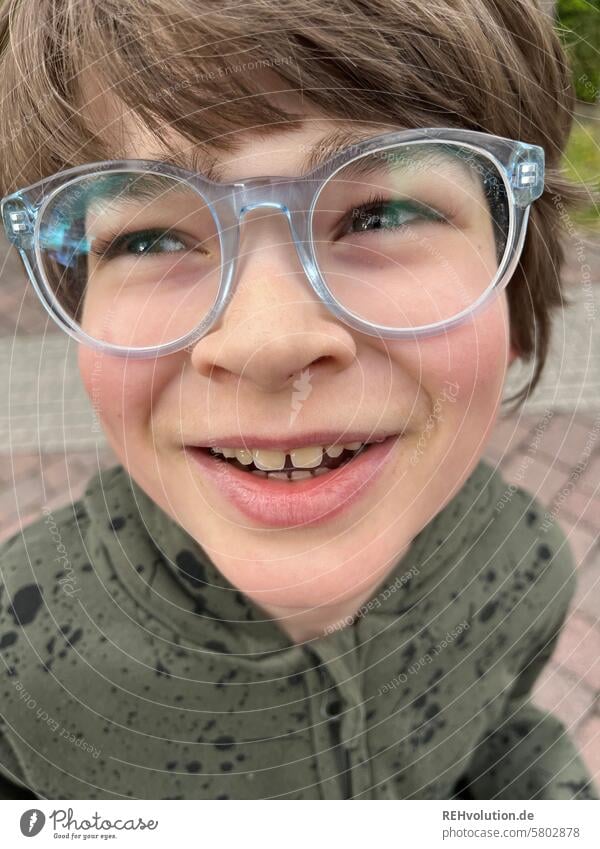 Boy with glasses Child Infancy Boy (child) Face portrait bollocks naturally Exterior shot Close-up Authentic