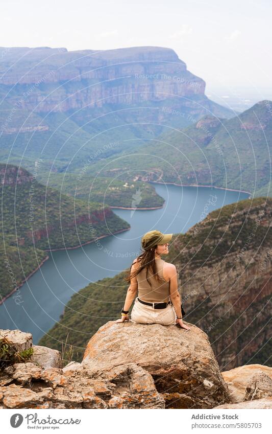 Woman admiring the Blyde River Canyon in South Africa woman hiker blyde river canyon south africa looking away nature outdoor adventure travel landscape