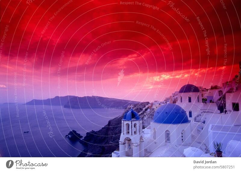 dramatic red sky with clouds over Santorini Sunset stormy atmosphere Thunderstorm atmosphere over Santorini red clouds scary sky