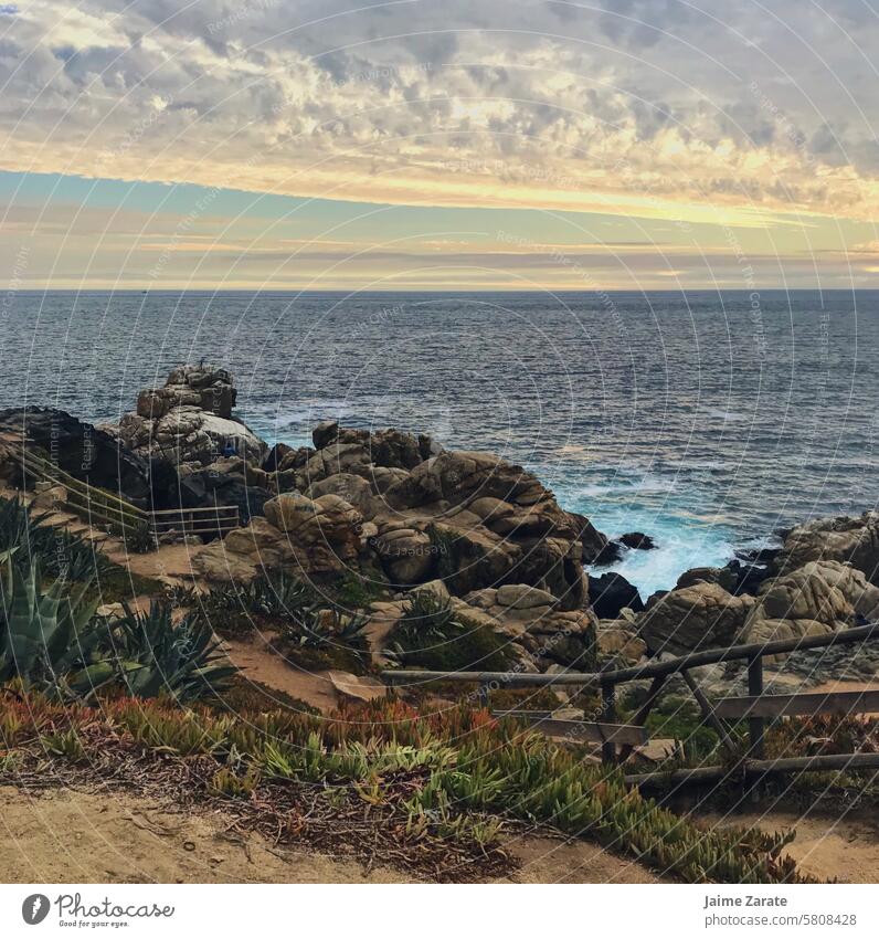 Path to reach the beach and touch Chilean waters sea world sunset sky rock stone stairs life nature