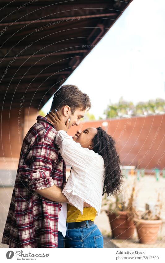 Reunited!: Young couple meeting at the station after a trip travel young happy transportation love tourism tourist journey smiling relationship traveler