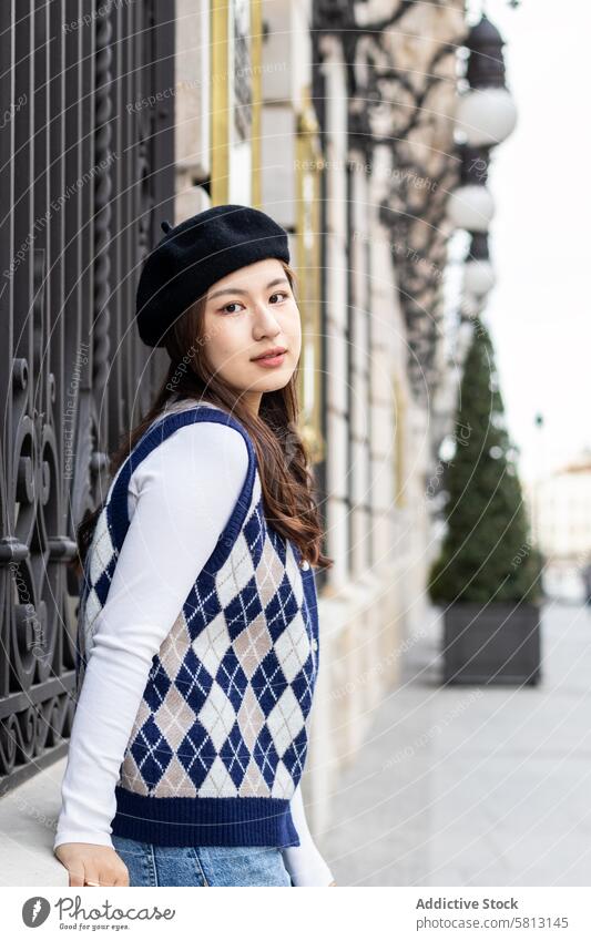 Portrait of a young Asian woman in the city asian people street happy lifestyle fun outdoors urban female cheerful fashion smiling casual modern youth enjoying