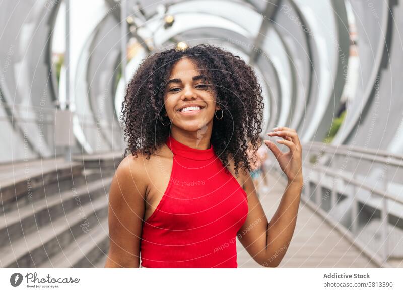 Portrait of a girl with afro hair enjoying in summer in the city African American Summer Youth Communication Joy Laughter Happiness Leisure Relaxation Outdoors