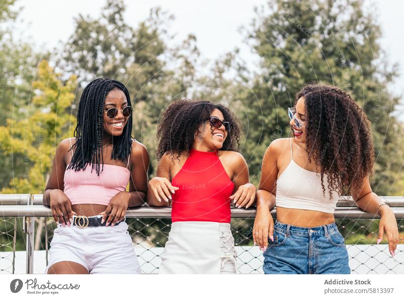 Stylish and Confident Young African American Women Summer Friends Diversity Youth Communication Joy Laughter Happiness Leisure Relaxation Outdoors Fun Enjoyment