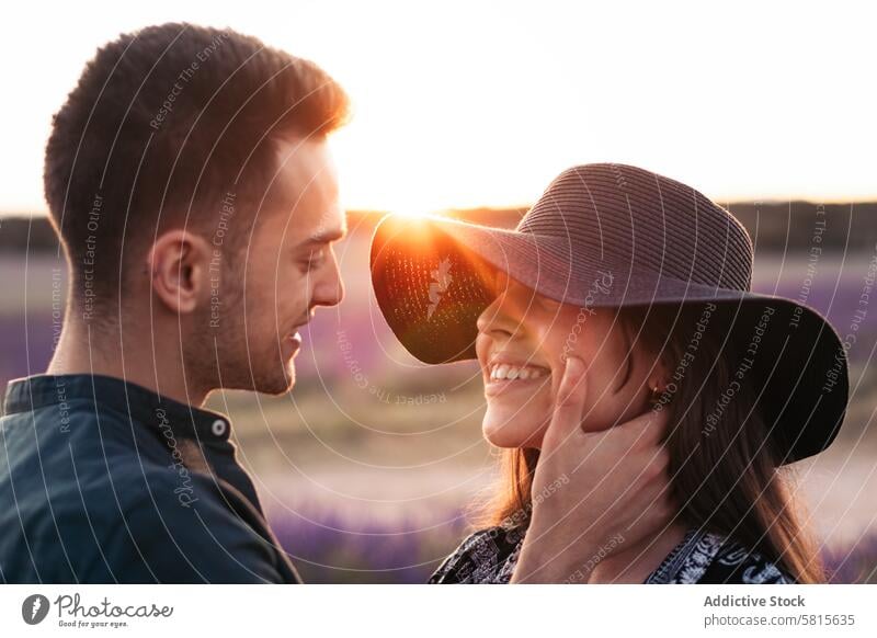 Couple in love in a lavender field at sunset couple woman summer purple happy together beautiful young nature romantic relationship lifestyle romance flower