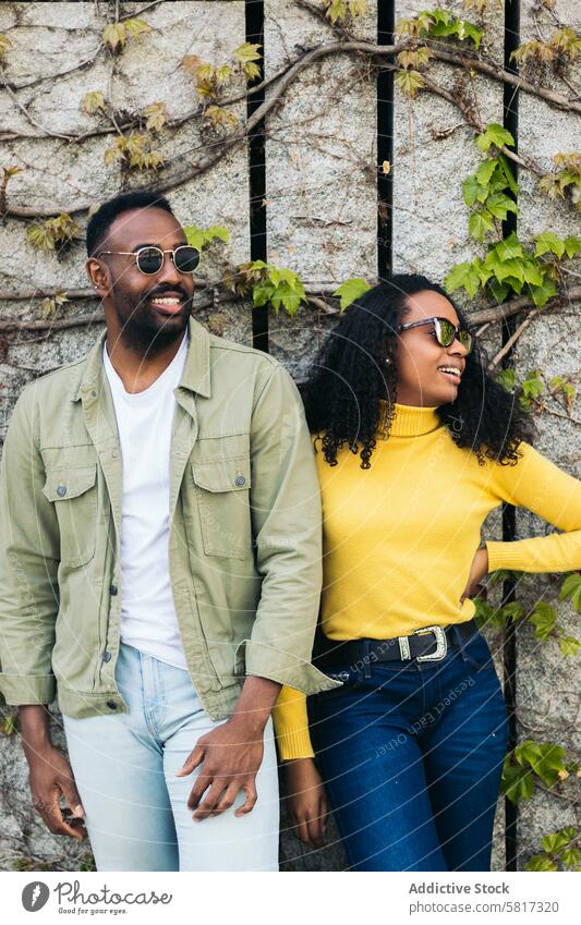 Attractive and stylish afro american man couple posing african attractive together woman male female young happy beautiful black handsome portrait casual