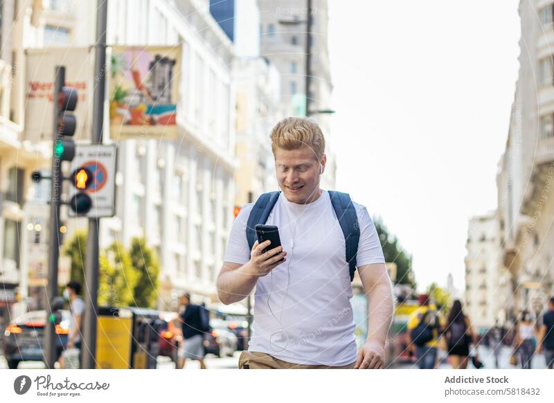 Young albino man using smartphone in the city white male guy blond isolated face person young hair adult handsome albinism blonde skin lifestyle expression