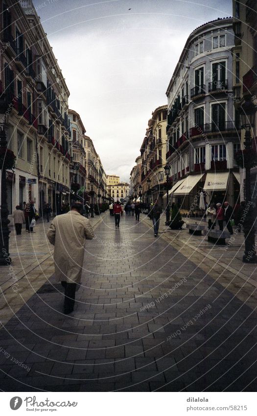 el hombre de la gabardina beige Town Malaga Winter Lomography Grief Distress street lonely rain gray man spain village cold alone rainy