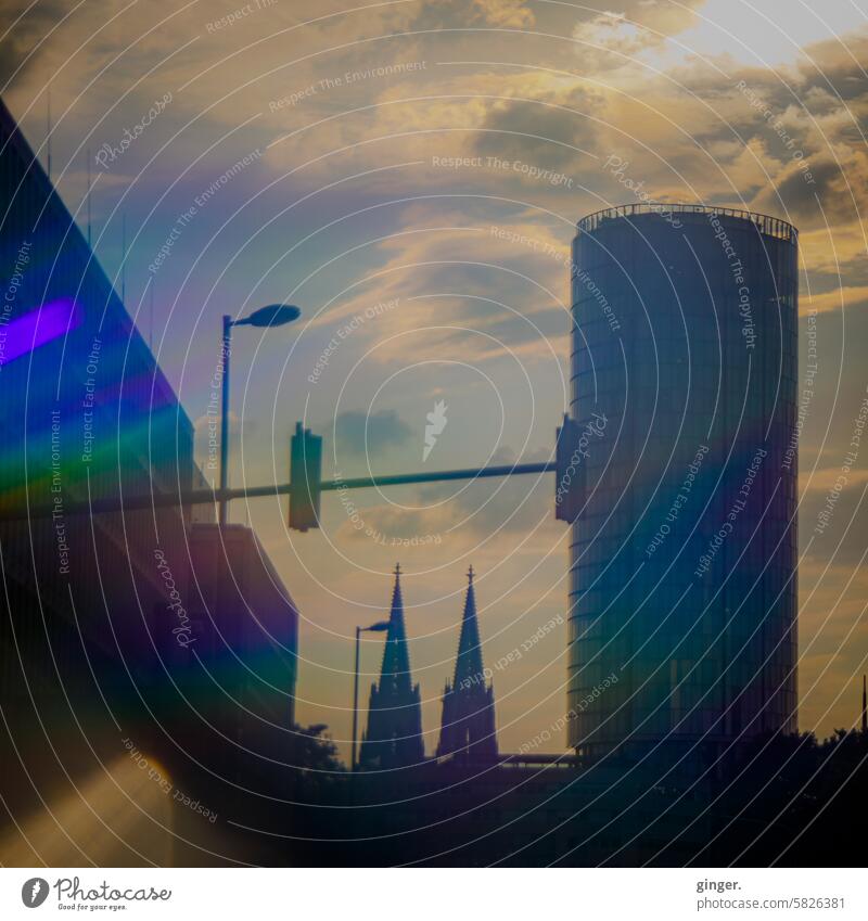 Cologne Cathedral framed by traffic lights and buildings in colorful sunshine - photography with prisms and filters Dome cathedral points Cologne Triangle