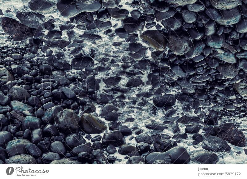Stones and sea stones Black Gray disorientation upside down Crazy Hard Soft Wet Abstract Water Ocean coast Exterior shot Nature Colour photo Deserted