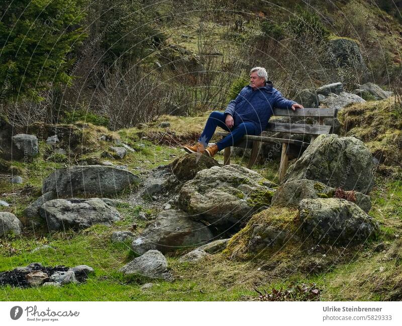 Pensioner recovers during a mountain hike more pensionable Man Senior citizen Adults people 70 - 80 years Gray-haired mountain valley Vergalda Montafon