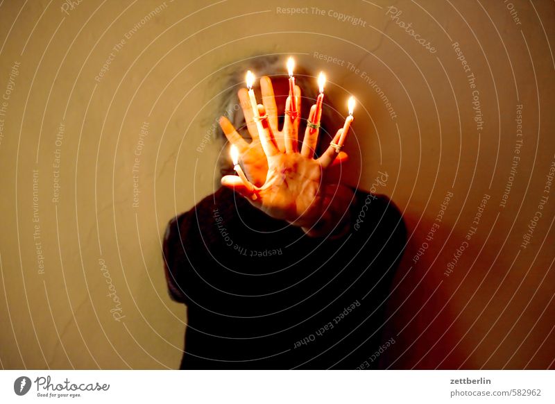 Christmas anticipation Christmas & Advent Flame Candle Candlelight Lighting Illuminate wallroth Anti-Christmas Human being Head Hand Fingers 5 Defensive