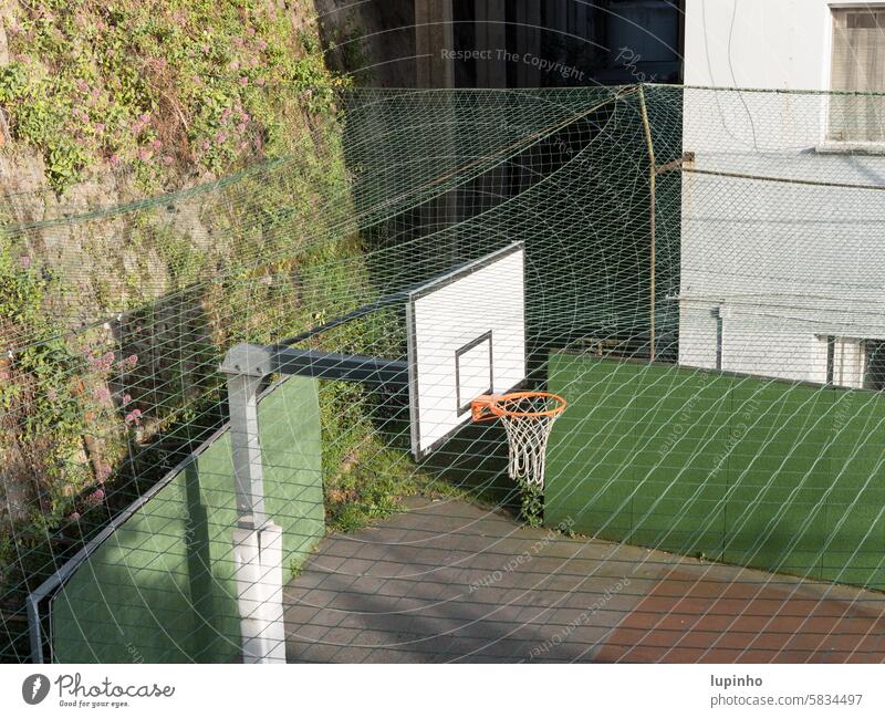 Section of a basketball court diagonally from above Basketball basket Playing field obliquely Above Net Exterior shot Colour photo Deserted