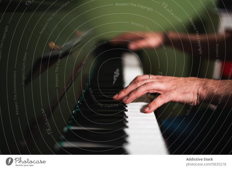 Close-up of hands playing an old piano music instrument keyboard close-up finger melody classical performance musician practice skill vintage artistic