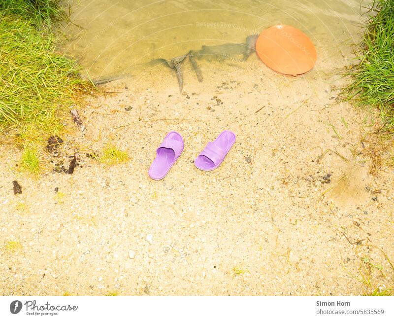 Plastic bathing slippers on a sandy beach Beach shoes Swimming & Bathing bathe be afloat Water Vacation & Travel Lake Leisure and hobbies Refreshment plastic