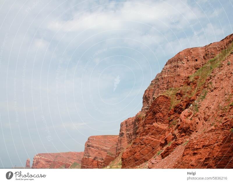 the red rocks on Heligoland Rock Red rock Helgoland Tall Anna Landscape Nature Island North Sea Islands Sky Clouds Exterior shot Colour photo coast Deserted