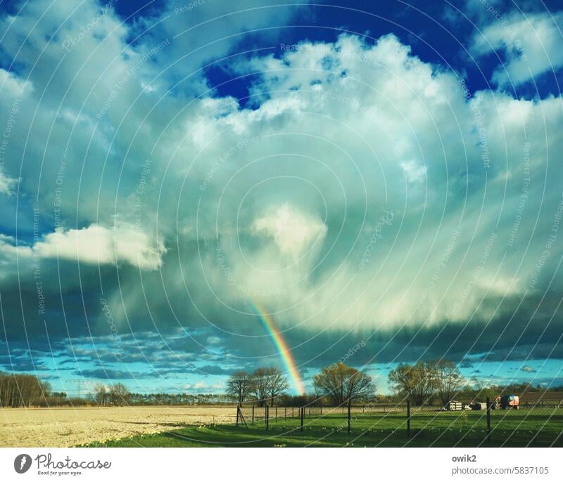 Unsettled weather Rainbow Sky Clouds Blue Environment Landscape Weather Exterior shot Deserted Colour photo Nature Beautiful weather Day Light Sunlight