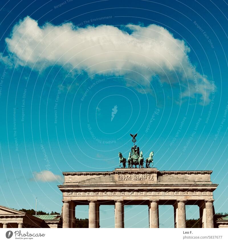 Brandenburg Gate with Blue Sky and Cloud in Berlin Germany Landmark Monument Quadriga Architecture Historic Neoclassical Symbol German reunification Blue sky