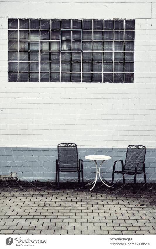 Sitting area with tristesse take a break dreariness Chair Table Seating Glass blocks Deserted