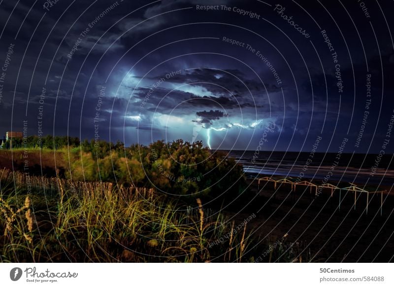 Thunderstorm with lightning over the sea Vacation & Travel Far-off places Environment Landscape Clouds Storm clouds Climate Climate change Weather Bad weather