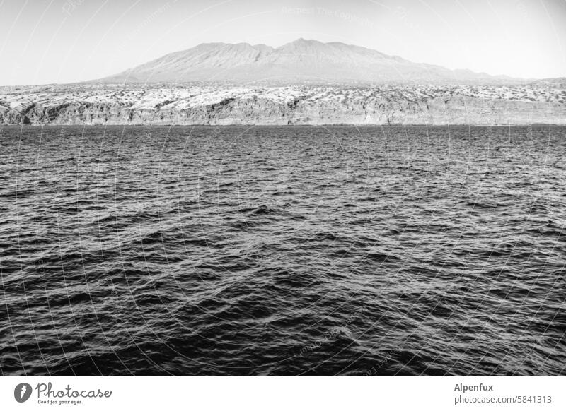 Volcano island seen from the Atlantic Land in sight Ocean Atlantic Ocean Volcanic island Vacation & Travel Water Exterior shot Mountain Landscape