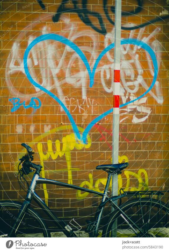 Lost Land Love IV Heart with bicycle Heart (symbol) Street art Bicycle Graffiti Spray Symbols and metaphors Associated turned off Heart-shaped Tags Metal post