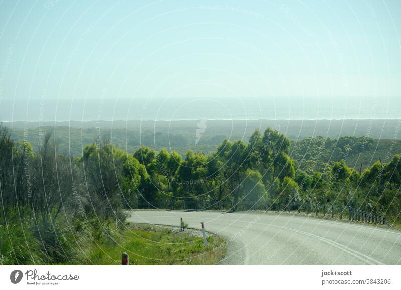 Winding road with a view of the ocean Street Traffic infrastructure Country road Traffic lane empty street Road movie In transit Median strip Lane markings