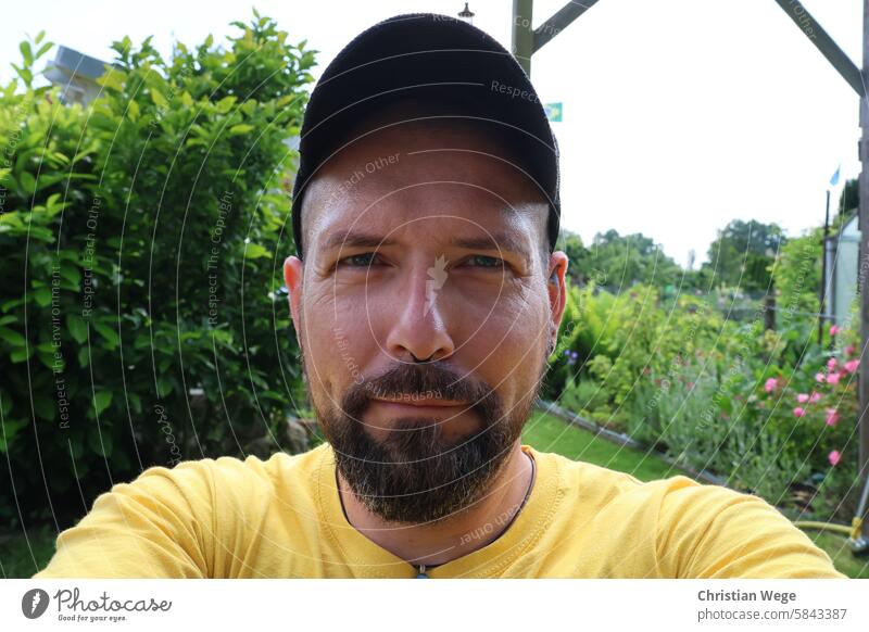 selfie in the garden, bearded, pircing and tattoos Selfie Facial hair Green Man Colour photo portrait Face Looking Designer stubble Adults Human being Masculine
