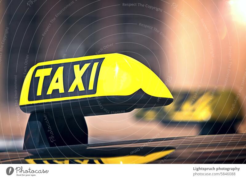 Close-up of Taxi car with yellow sign on city street. Business Car City City Break City Life City Street Cityscape Color Image Concepts Downtown District