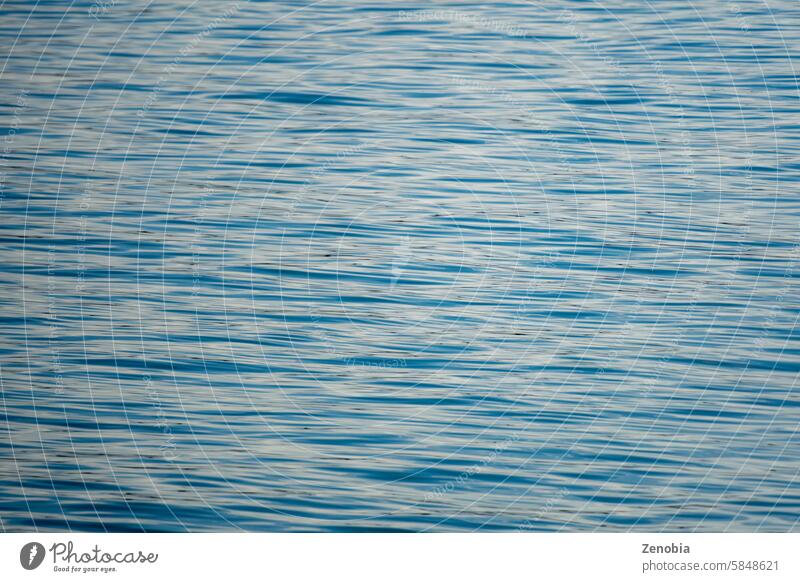 Smooth ocean water texture. Blue-green nature background, Pacific Ocean taken from New Zealand. glassy calm abstract lake meditation pure peace sustainability