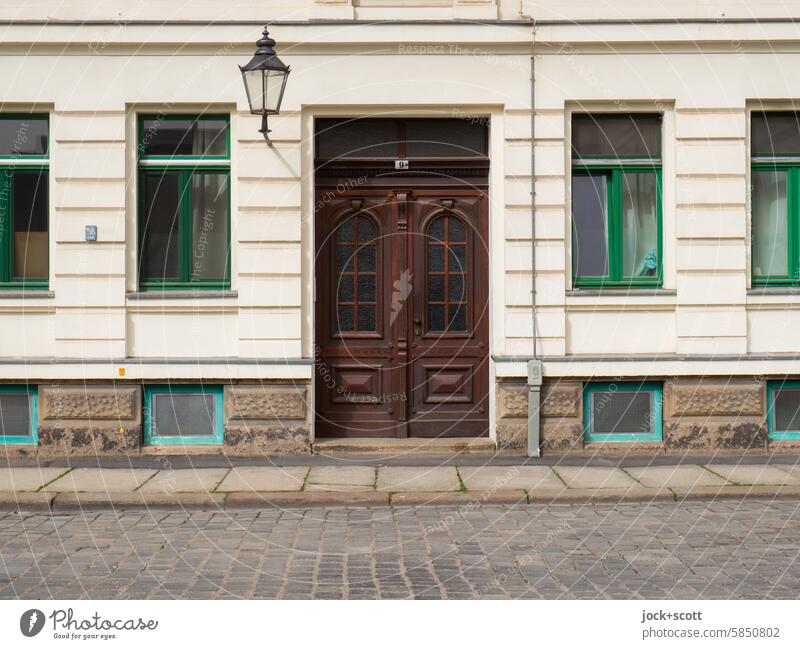 time-honored facade Facade Town house (City: Block of flats) Entrance Old Style Sidewalk Street Cobblestones House (Residential Structure) door Front door Past