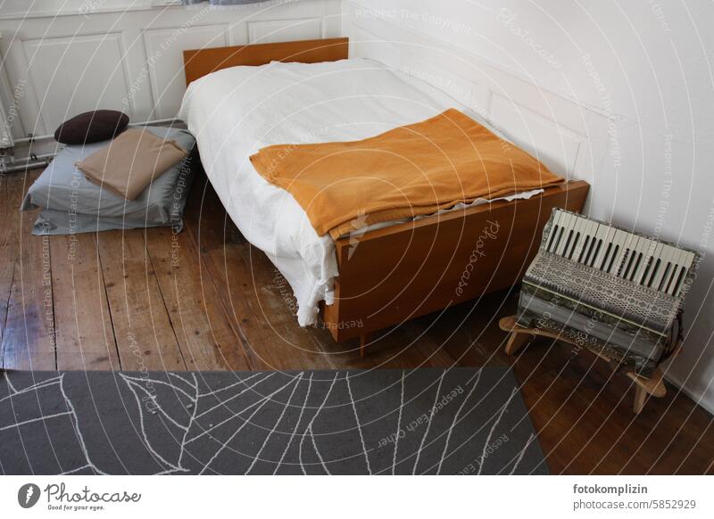 Simple bed with accordion Accordion Bed tool unostentatious Music Room Musical instrument Life Emotions room Longing Homesickness Loneliness Modest