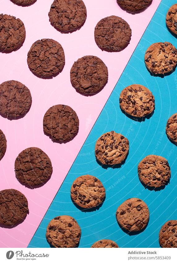 Homemade Cookies on Pink and Blue Surface – Flat Lay American Cookies Arrangement BAKING Baked Dessert Baked Sweets CHOCOLATE COOKIES Choc Chip Chocolate Chips