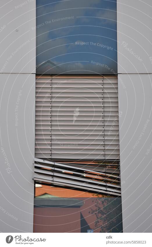 Urban sloping site | vacant office complex with damaged blinds. Building Window Roller shutter Facade Architecture House (Residential Structure) Closed