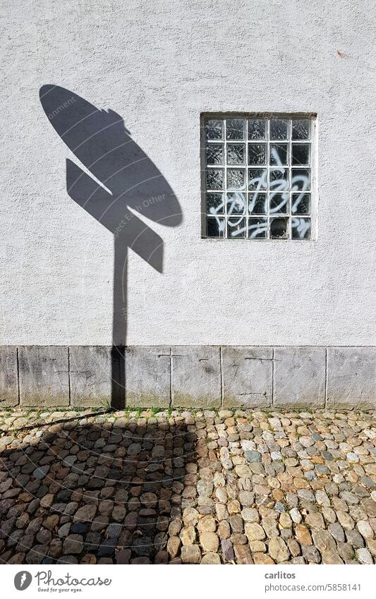 Shadow play in Gällelegässle | From the series Germany's most beautiful street names sign Window Glass blocks Cobblestones Round square Wall (building)