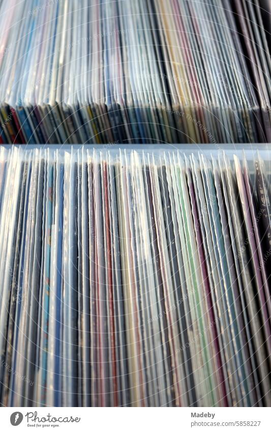 Old vinyl records and long-playing records in transparent plastic sleeves in plastic containers in front of an old record store in the Bornheim district of Frankfurt am Main in the German state of Hesse