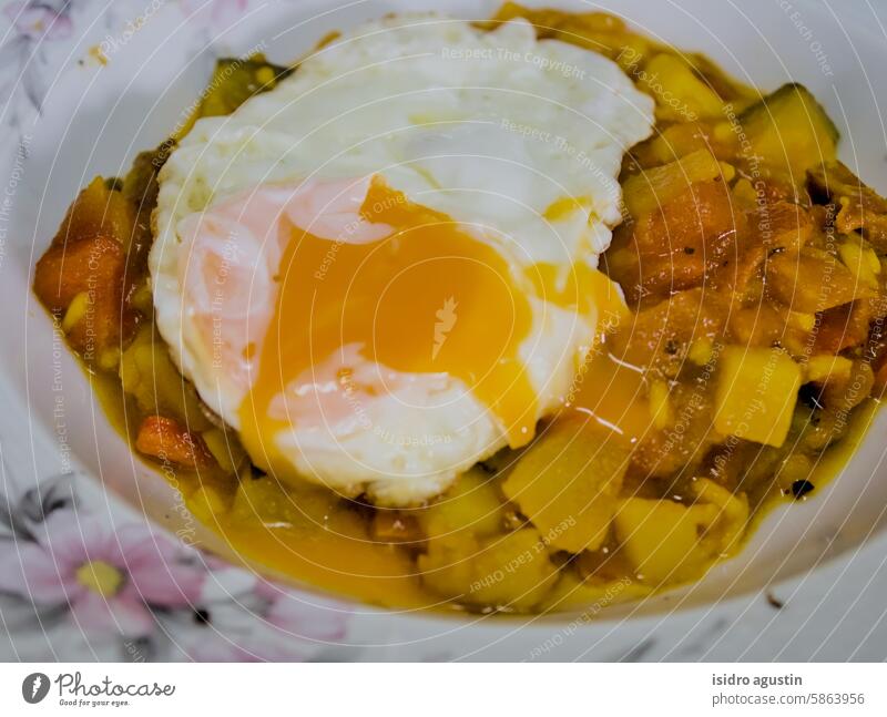 farm fresh egg on fresh vegetables fried egg sauce nourishing olive oil tomatoes salad spinach incoming dish dinner healthy natural kitchen green vegetarian