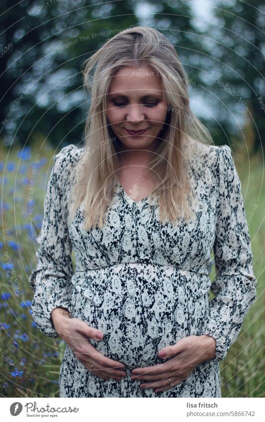 WOMAN - LOOKING DOWN - BABY BUMP Woman pregnancy Blonde cornflowers Pregnant pregnant woman maternity Stomach Baby Love Mother youthful pretty parenthood Life