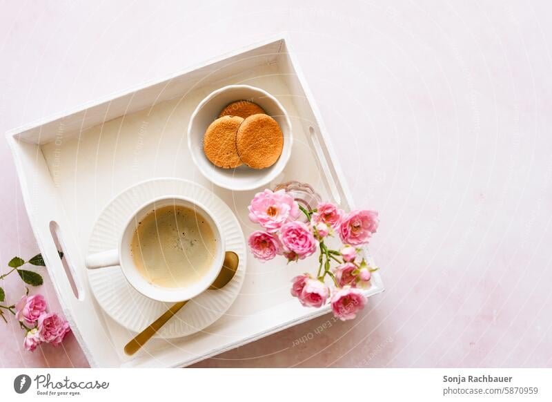 A serving tray with a coffee cup and cookies. Top view. Coffee Cup Cookie Plate Flower Vase Hot drink Beverage To have a coffee Breakfast Coffee break