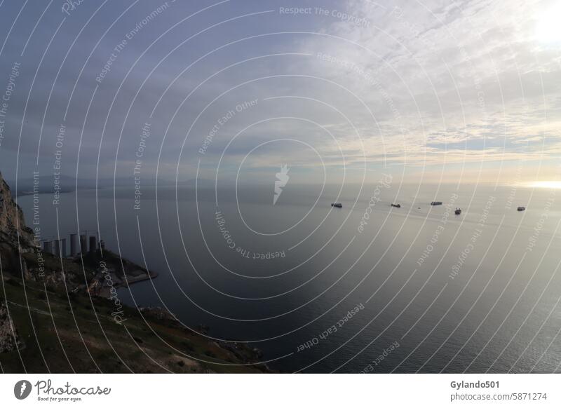 View from the Rock of Gibraltar over the Mediterranean with waiting ships Gibraltar Rock Skirt Cargo-ship Mediterranean sea outlook Ocean Sky Landscape Water